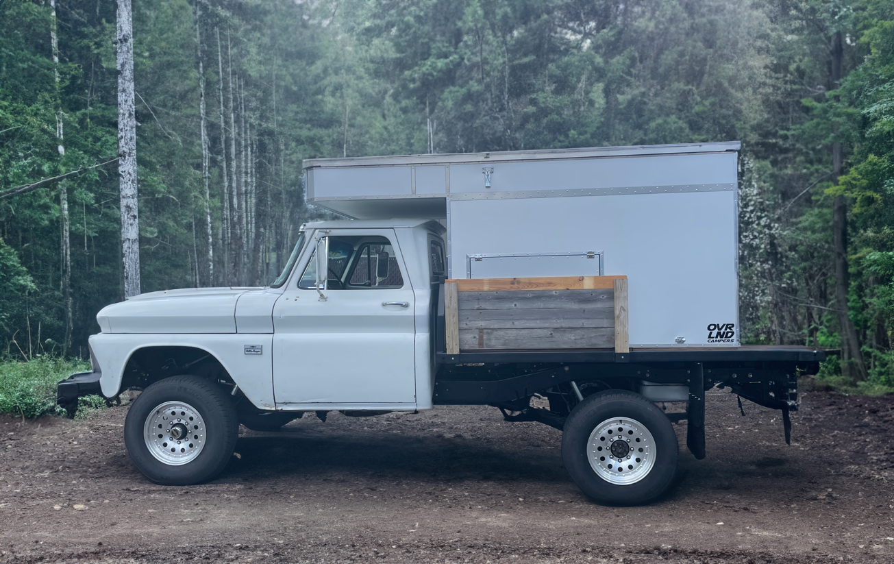 Custom built flatbed pop top camper for callssic truck.